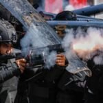 Demonstrasi meletus di seluruh Indonesia setelah seorang pengemudi layanan berbagi tumpangan tewas dalam demonstrasi.