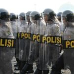 INDONESIA: Delapan aktivis terancam hukuman penjara bertahun-tahun karena melakukan protes damai.